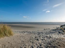 De Strandloper Vakantiehuisje aan het strand - Ferienwohnung am Meer, villa in Baarland