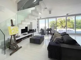 Villa Rosa del mare - Villa fronte mare di design con camino e giardino privato