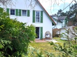 Düne 4 - Ferienunterkunft mit eigenem Garten in der beliebten Dünenresidenz - sanftes Meeresrauschen inklusive, ξενοδοχείο σε Ostseebad Karlshagen