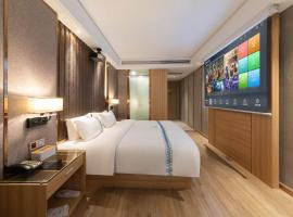 铜仁木杉河大酒店، فندق في Xieqiao