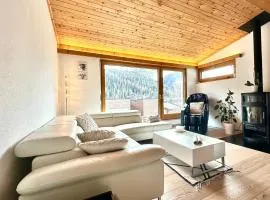 Chasa Stefania, modernes Engadiner Haus mit Wellness und Sauna