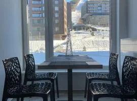 Apartment with a view of the ski slope