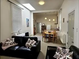 Enjoy stylish living, tranquil, stroll to river