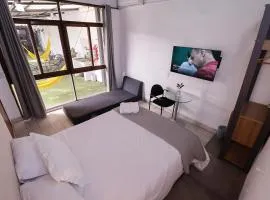 Habitación privada con terraza y WiFi rápido en el centro