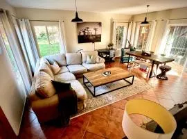 Spacious 2-bed, 2-bath villa with garden and parking