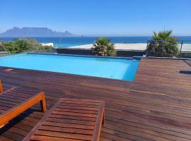 Infinity Beachfront 607 - Seaside Bliss Self-Catering Apartment, cheap hotel in Bloubergstrand