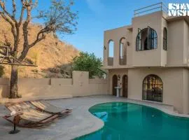 StayVista at Vanya Veda with Bathtub, Pool & Lawn