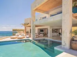 NEW Stunning Villa, full staff, gym and has its own Private Swimmable Beach