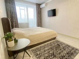 Уютные апартаменты в новом жилом комплексе, hotel in Qostanaj