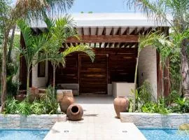 NHOA 203B Lux 1BR Condo Pool View in Aldea Zama