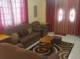 Charming Piarco Home with Garden View