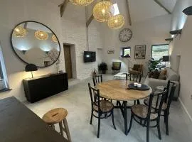 Beudy at Pentrecelyn - a gorgeous barn conversion with hot tub