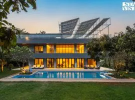 Reflection House by StayVista with Pool, Terrace bar, Indoor games & Exquisite interiors in a nutshell