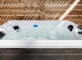 Modern Lux King Suite, cozy Hot tub & Central Omaha!
