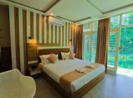 By the stream resort wayanad