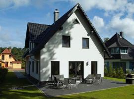 Dünenresidenz Glowe - Ferienhaus Maxi 200 m zum Strand, hotel a Glowe