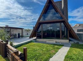 Nova cabana com jacuzzi perto do mar, hotel in Arroio do Silva