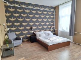 Sziget Apartman, hotel in Tata