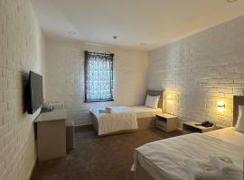 Macan Boutique Hotel by The Roomz Group, hotel en Yunusobod