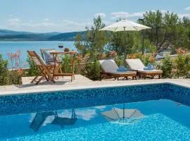 Seafront Villa Noah with heated pool