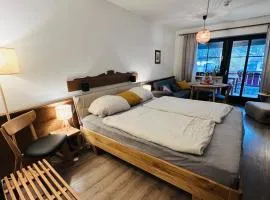 Fewo mit toller Dachterrasse & Bademantelgang zur Wohlfühltherme im neuen Stil