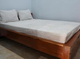 OYO 92744 Coconut Island Homestay & ResortNearPantai Pulau Merah, hotell sihtkohas Pasanggaran