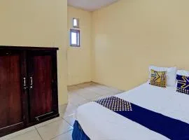 SPOT ON 92730 Lili Kost SyariahNearKetapang Royal City