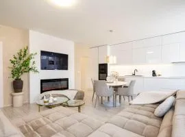 ALURE RESIDENCES 13 & 24h self check-in, fireplace,private parking in front of the apartment building included, new building, green area with meadows and forests