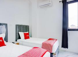Capital O 94254 Dental Inn, hotel v destinaci Banda Aceh
