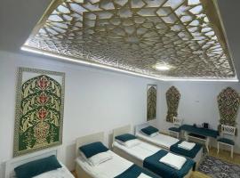 Olimxon Guest House, hotel en Bukhara