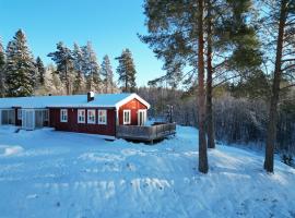 Wildlandia Älg Ferienhaus, Hotel in Hagfors