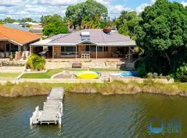 Canal-Side Retreat with Private Jetty