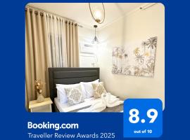 Palawan 2BR Staycation with Swimming Pool, Gym & Parking - B1 5Kunzite, acomoda&ccedil;&atilde;o em condom&iacute;nio em Puerto Princesa