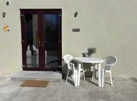 Private Detached Small Bedroom and Bathroom Only- This is not an apartment- No clothes storage or cooking facilities