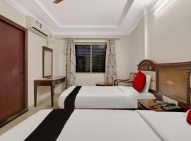 Capital O Elegant Amethyst Business Hotel Near Ragigudda Sri Prasanna Anjaneyaswamy Temple, hotel di Bangalore
