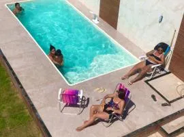 Casa Próx a praia com diversão para familia