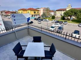 Alloggi Centrale, hotel v destinaci Porto Tolle