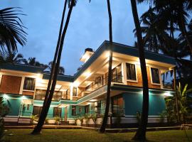 Fusion Home，安朱納的有停車位的飯店