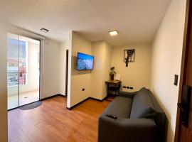Moderno apartamento de 1 dormitorio con vista a la ciudad, alojamiento en Cochabamba