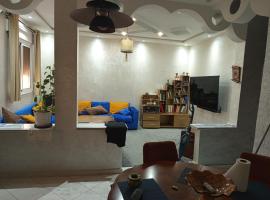 À mi-chemin, hotell sihtkohas Larache