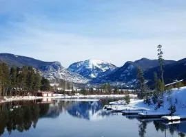 Hummingbird Heaven Cozy Cabin 1 Block to Lake, located in Town
