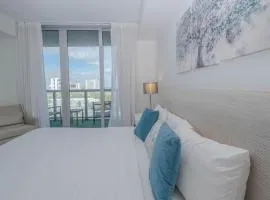 Steps from the beach 2B 2B Pool, Gym, and More