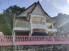 Hotel O Penginapan & Villa Sirait