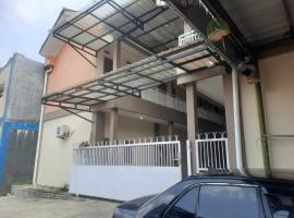 Hotel O Guest House Pak Eman، فندق في تْشيريبون