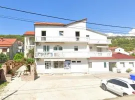 Apartments with parking space Palit, Rab - 23622