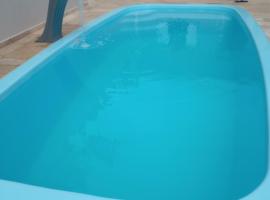 Casa e Área de lazer em Rubião Júnior, Hotel in Botucatu