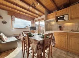 Appartement au pied des pistes avec terrasse, parking privé, casier à skis, proche commerces - FR-1-595-75