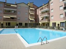 Holiday apartment with pool near the beach