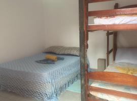 Pernoites -Quartos e Suítes, מלון בCapivari