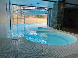 Appartement 2-4 personnes avec 1 chambre - Résidence les 100 lacs à Cauterets avec balcon et piscine chauffée, hotel in Cauterets